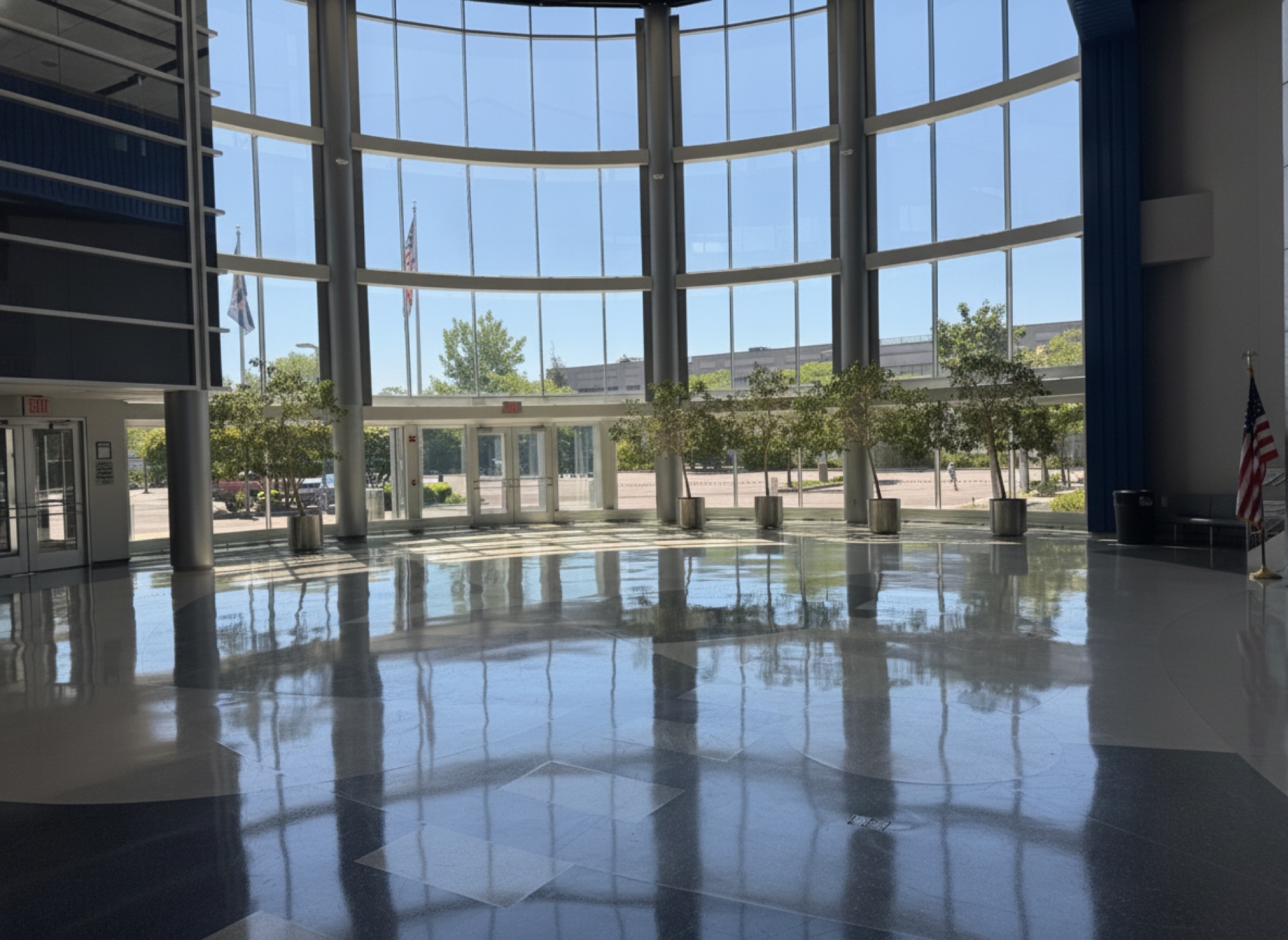The atrium entrance with flags