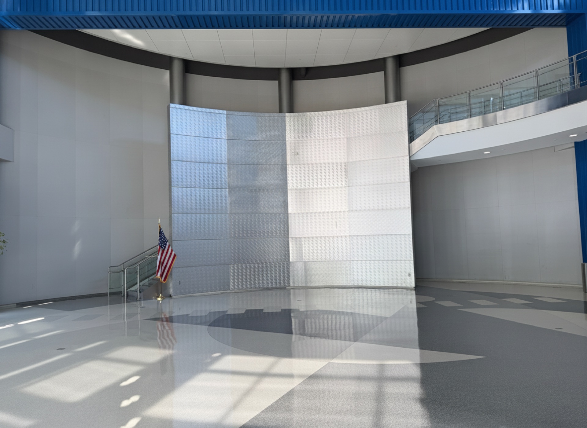 The atrium's sculptural metal feature wall